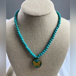Turquoise Color Stone Beads with Gold Butterfly Pendant